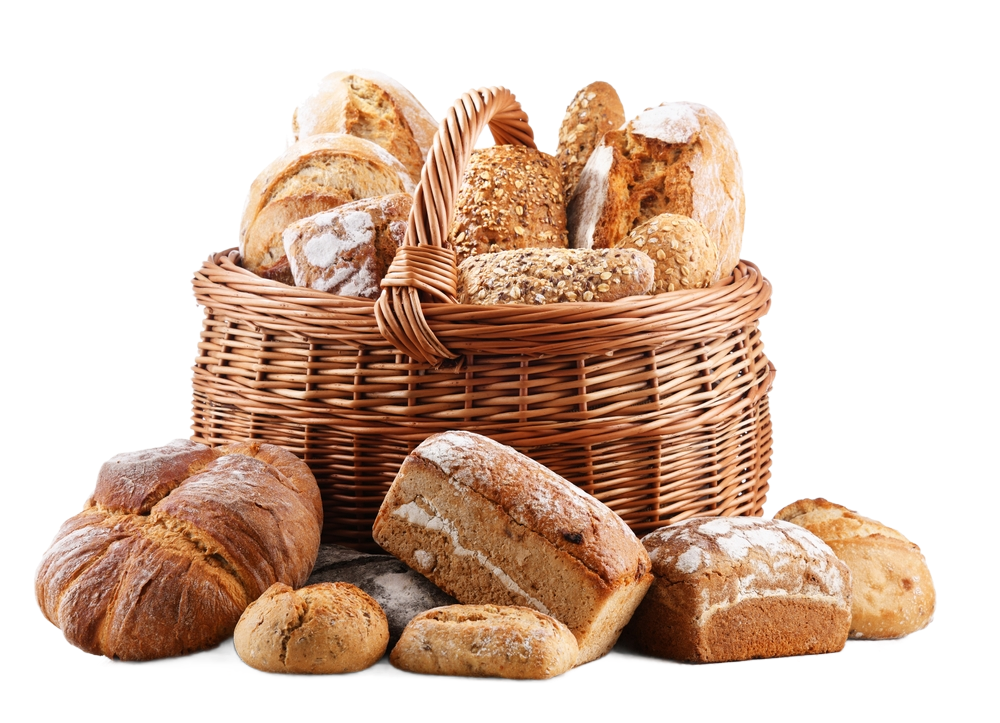 Wicker basket filled with fresh artisan breads and rolls